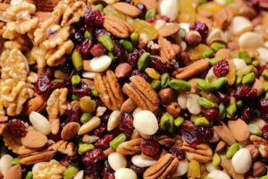 Close-up of mixed nuts, pistachios, almonds, and dried fruit
